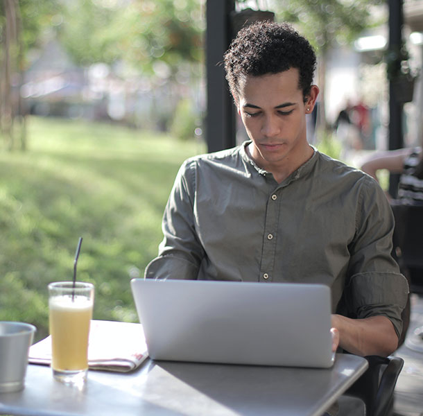 young man on his laptop